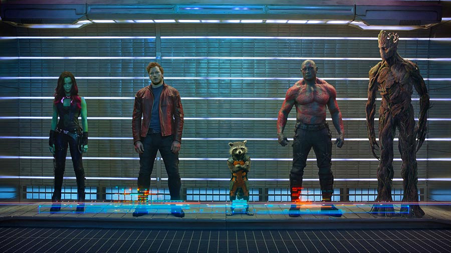 Gamora, peter quill, rocket raccoon, drax, and groot line up in this promotional photo.